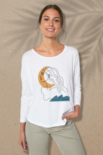 A white long-sleeved shirt for women made from eco-friendly organic cotton. The shirt has a relaxed fit and a front print with a woman's, crescent and wave design. The fabric has a soft texture and offers the wearer a comfortable wearing experience. The product is environmentally friendly and promotes conscious consumption.